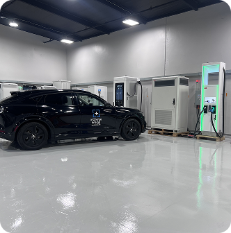 Clean training bay with vehicle and DC fast chargers
